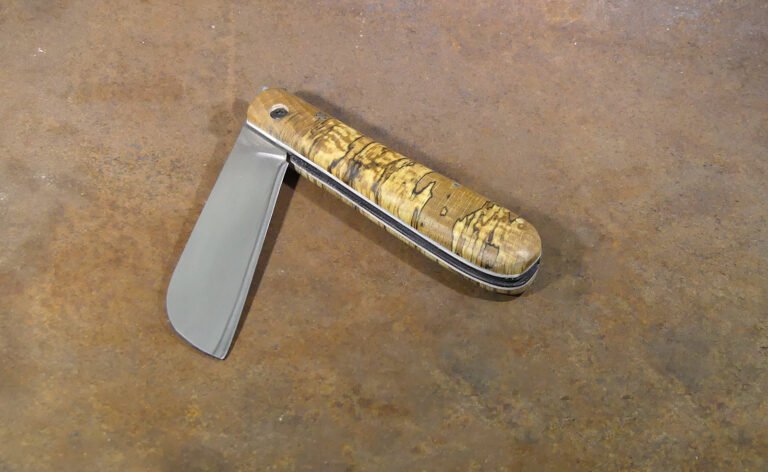 Lame en sandwich inox/125SC - Manche en hêtre échaffé, de bout, stabilisé.